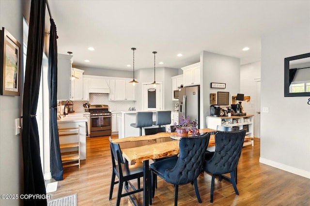 2153 S Withers Rd, Wasilla, AK 99654 - dining room featuring light wood finished floors and recessed lighting