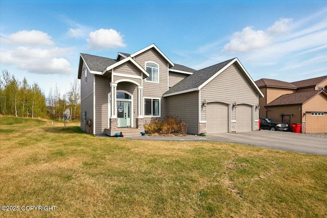 2153 S Withers Rd, Wasilla, AK 99654 - traditional home with an attached garage, a front yard, asphalt driveway, a shingled roof, and stone siding
