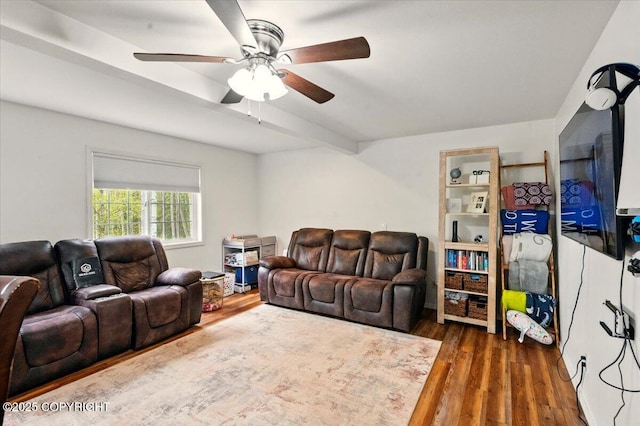 living room with a ceiling fan and dark wood finished floors