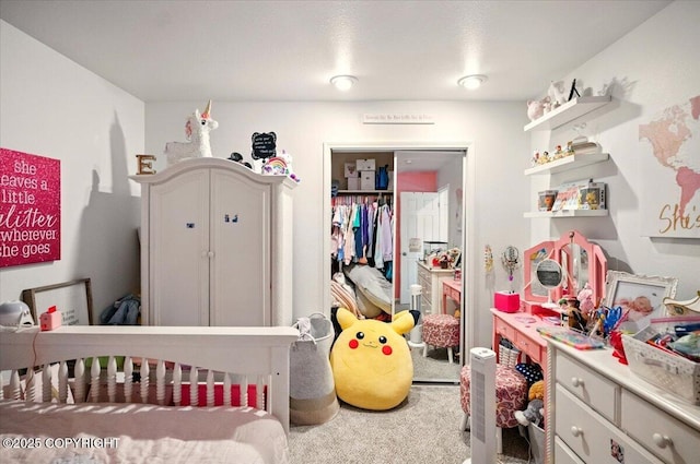 carpeted bedroom with a closet
