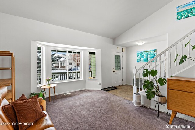 1734 Concord Hill Dr, Anchorage, AK 99515 - foyer featuring baseboards, stairs, carpet floors, and vaulted ceiling