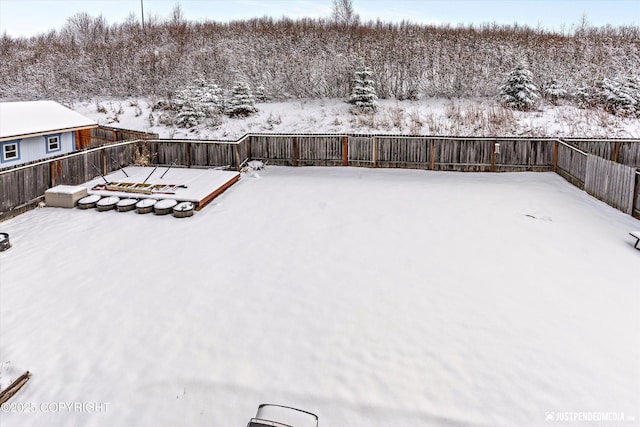 1734 Concord Hill Dr, Anchorage, AK 99515 - yard covered in snow with a fenced backyard