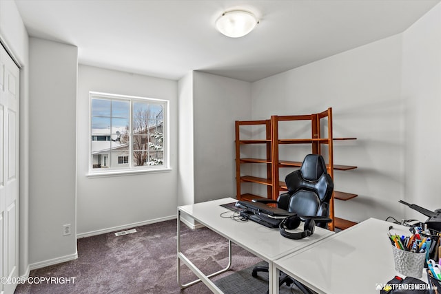 1734 Concord Hill Dr, Anchorage, AK 99515 - office area featuring dark colored carpet, visible vents, and baseboards