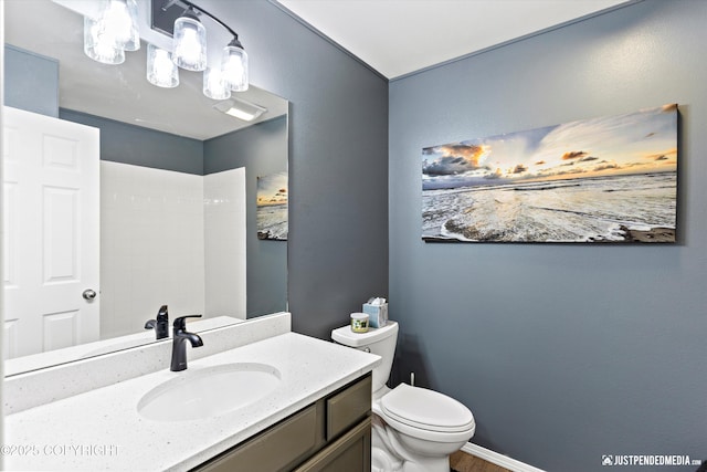 1734 Concord Hill Dr, Anchorage, AK 99515 - bathroom featuring walk in shower, vanity, and toilet