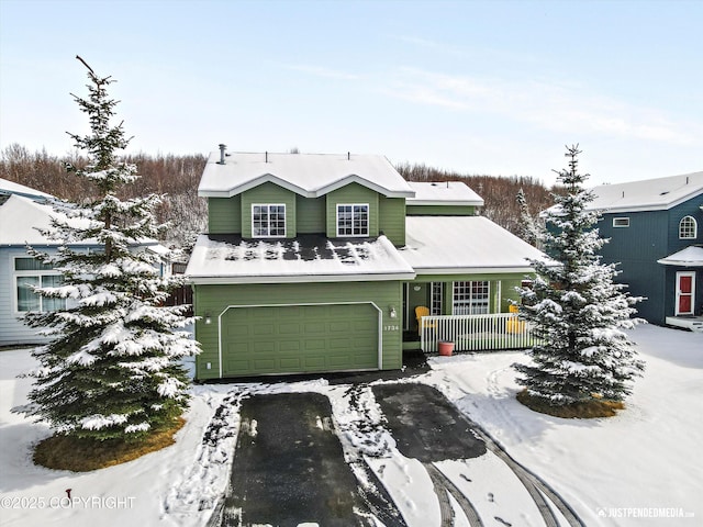 1734 Concord Hill Dr, Anchorage, AK 99515 - view of front of property with aphalt driveway and an attached garage