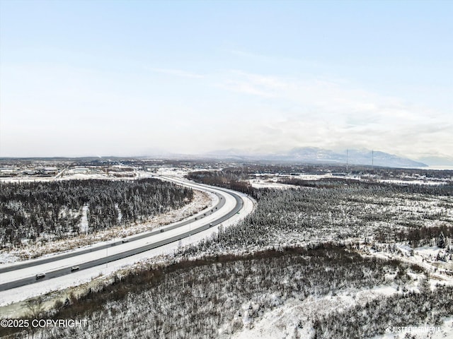 1734 Concord Hill Dr, Anchorage, AK 99515 - snowy aerial view with a mountain view