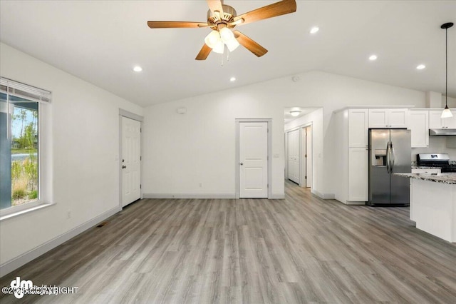 unfurnished living room with lofted ceiling, light wood-type flooring, a ceiling fan, baseboards, and recessed lighting