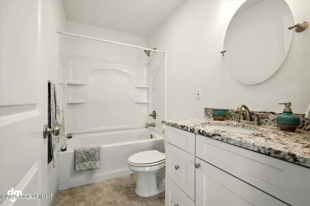 bathroom with vanity, toilet, and bathtub / shower combination