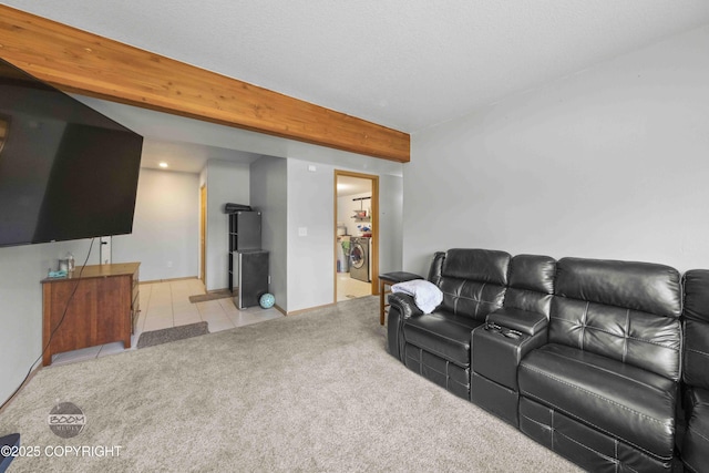 carpeted home theater featuring beam ceiling, tile patterned flooring, separate washer and dryer, and recessed lighting