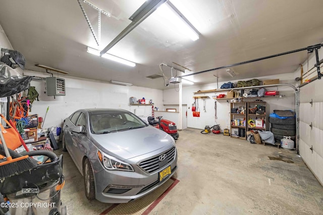 garage featuring a garage door opener