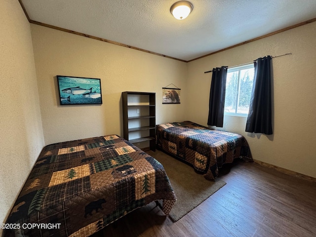 46050 Lax Cir, Soldotna, AK 99669 - bedroom featuring crown molding, a textured ceiling, a textured wall, and wood finished floors