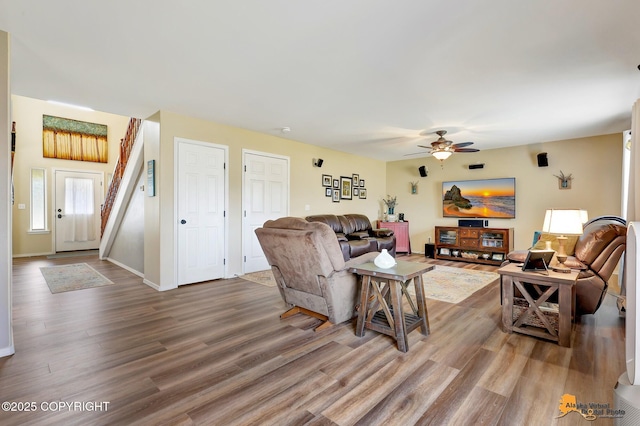 3690 S Granite Ln, Wasilla, AK 99654 - living room with wood finished floors, ceiling fan, and baseboards