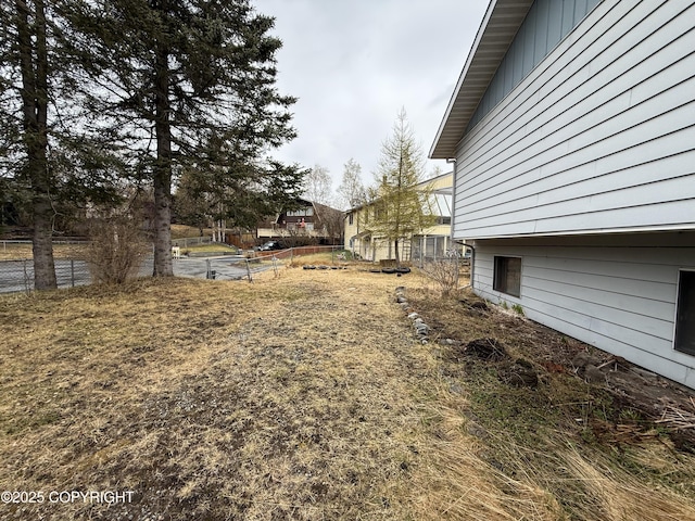 view of yard featuring fence