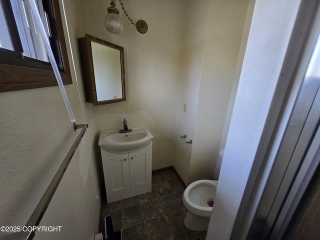 half bath with vanity and toilet
