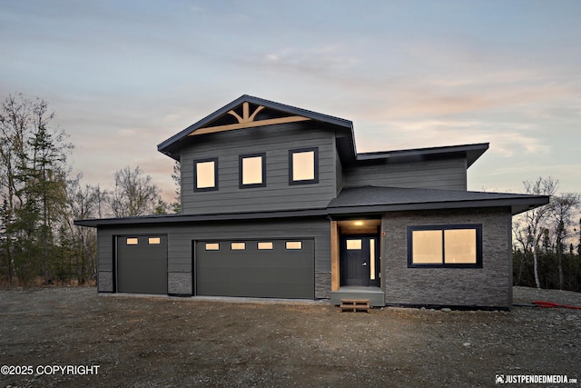 1631 W Valley Ridge Dr, Wasilla, AK 99623 - view of front of house with a garage and driveway