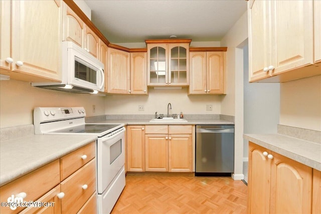 2631 Palmer Ct # C6, Anchorage, AK 99508 - kitchen with white appliances, light brown cabinets, and a sink