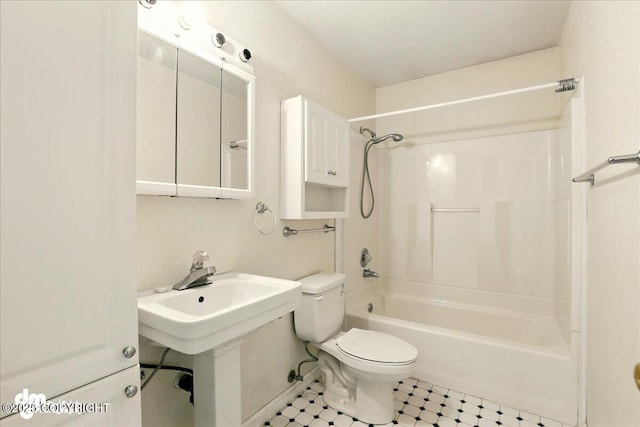 2631 Palmer Ct # C6, Anchorage, AK 99508 - bathroom featuring shower / washtub combination, toilet, baseboards, and tile patterned floors