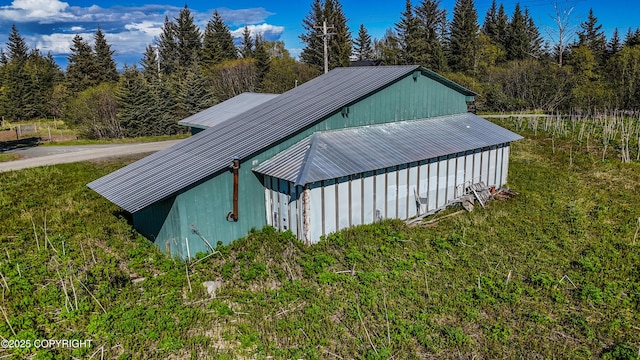 71265 Kallman Dr, Anchor Point, AK 99556 - view of pole building with a lawn