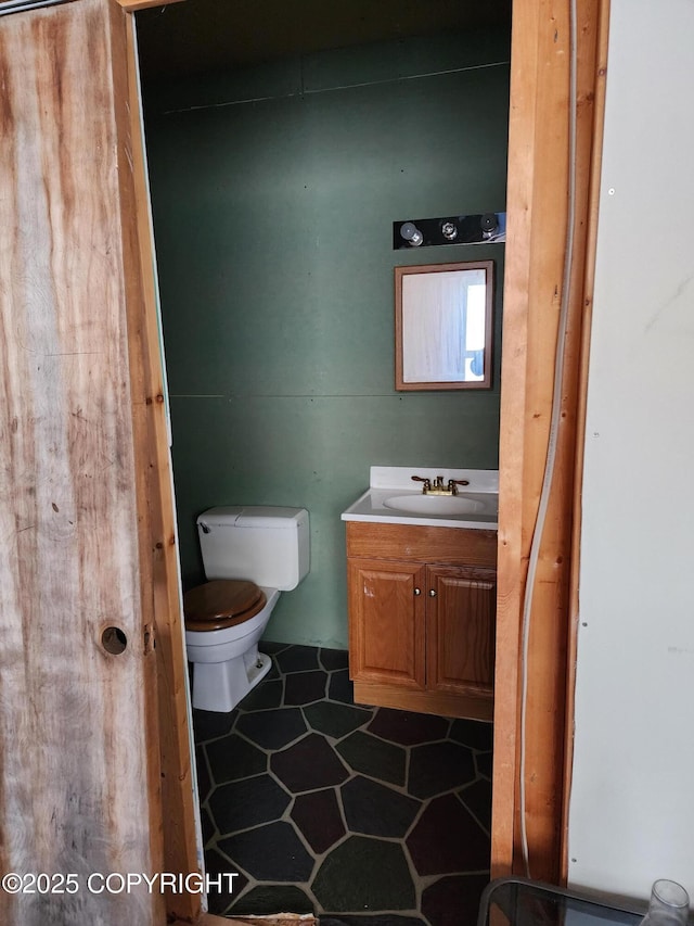 5920 Old Valdez Trl, Salcha, AK 99714 - half bathroom with vanity and tile patterned floors
