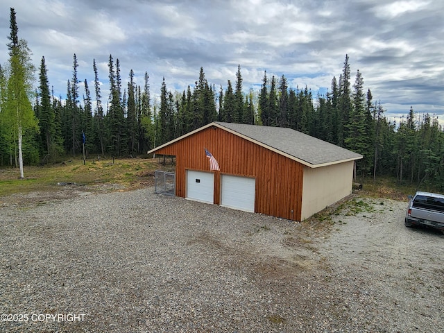 5920 Old Valdez Trl, Salcha, AK 99714 - detached garage with a view of trees