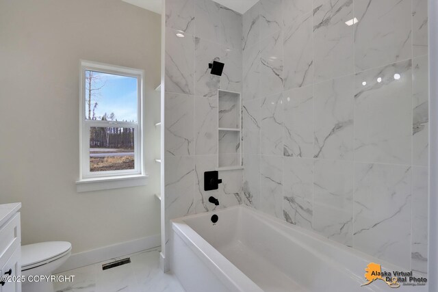 bathroom featuring visible vents, vanity, baseboards, toilet, and marble finish floor