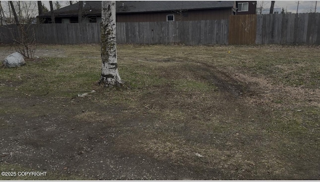 view of yard with fence