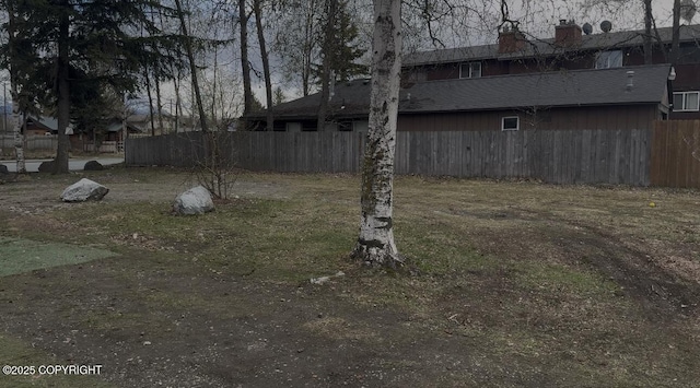 view of yard with fence