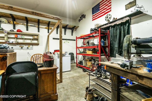 office area with concrete flooring and a workshop area