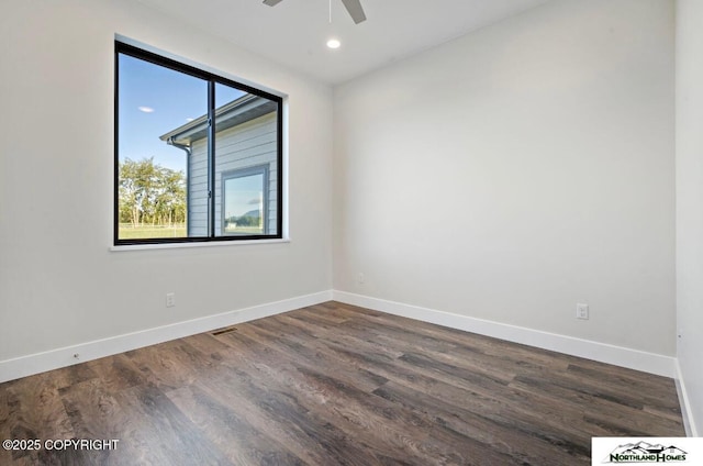 1205 N Williwaw Way, Wasilla, AK 99654 - unfurnished room featuring baseboards and dark wood-style floors