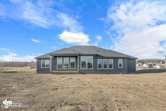 2600 S Sanctuary Dr, Wasilla, AK 99654 - rear view of property with roof with shingles