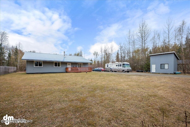 view of yard featuring a wooden deck