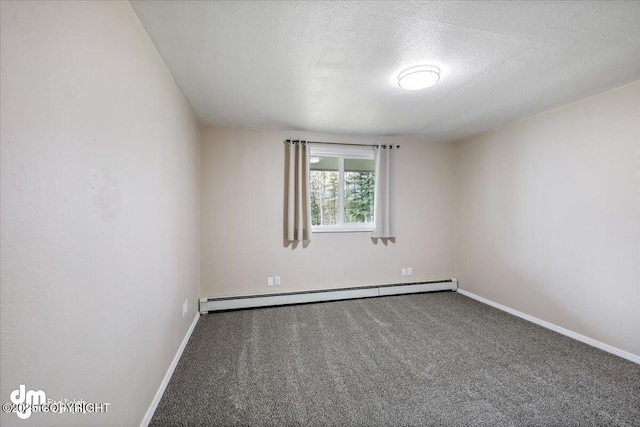 empty room with baseboards, a baseboard radiator, carpet flooring, and a textured ceiling