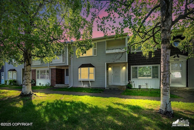3294 Montpelier Ct # 12-E, Anchorage, AK 99503 - multi unit property with a yard and board and batten siding