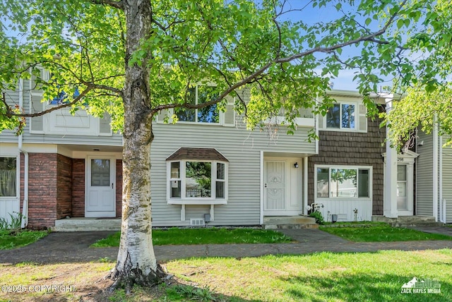 3294 Montpelier Ct # 12-E, Anchorage, AK 99503 - view of property with a front lawn