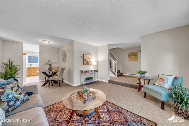 3294 Montpelier Ct # 12-E, Anchorage, AK 99503 - carpeted living room featuring a baseboard heating unit, stairs, a textured ceiling, and baseboards