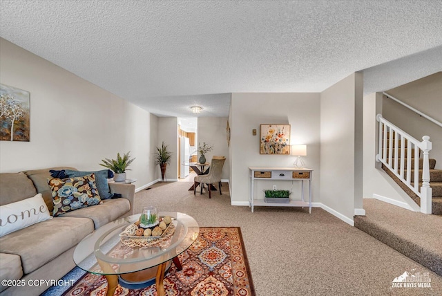 3294 Montpelier Ct # 12-E, Anchorage, AK 99503 - living area with stairway, carpet flooring, a textured ceiling, and baseboards