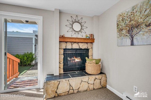 3294 Montpelier Ct # 12-E, Anchorage, AK 99503 - detailed view of carpet flooring, a fireplace, baseboards, and a baseboard radiator