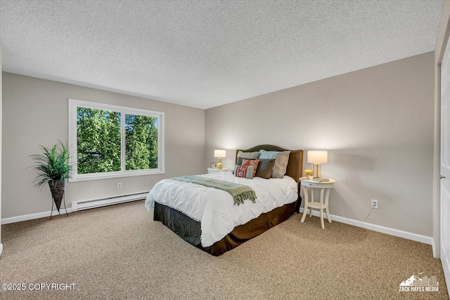 3294 Montpelier Ct # 12-E, Anchorage, AK 99503 - bedroom with baseboard heating, carpet flooring, baseboards, and a textured ceiling