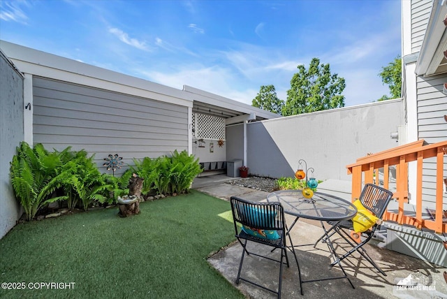 3294 Montpelier Ct # 12-E, Anchorage, AK 99503 - view of yard with a patio area and outdoor dining space