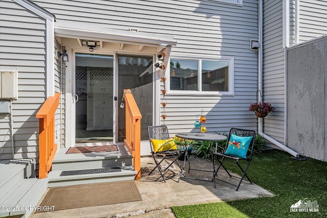 3294 Montpelier Ct # 12-E, Anchorage, AK 99503 - view of exterior entry with a patio