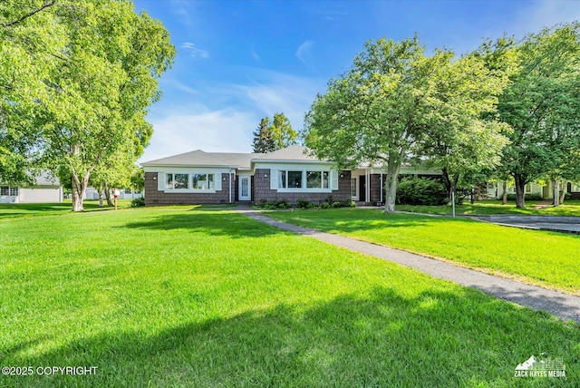 3294 Montpelier Ct # 12-E, Anchorage, AK 99503 - view of front facade featuring a front lawn