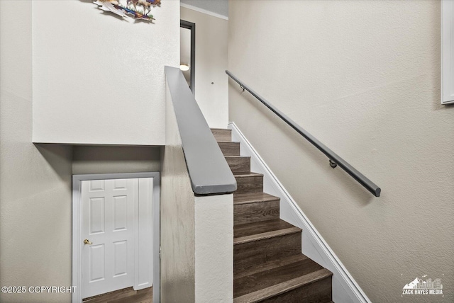 stairs with a textured wall