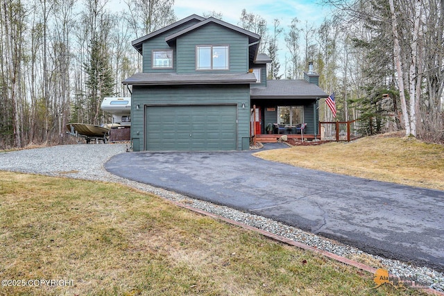 view of front of home with a garage, a porch, a front lawn, and aphalt driveway