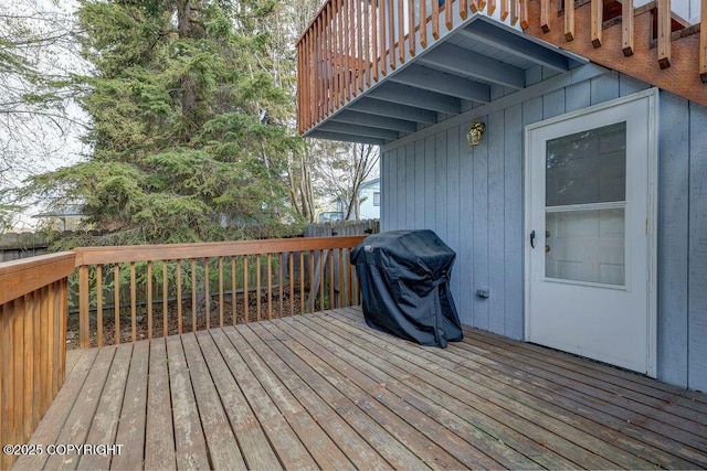 deck featuring a grill