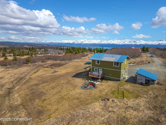 view from above of property featuring a mountain backdrop