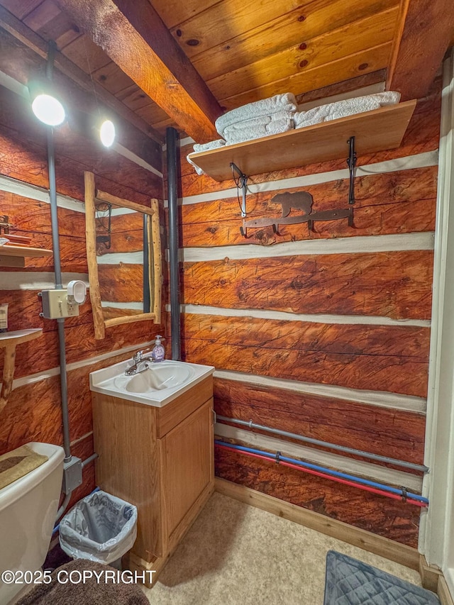 bathroom with vanity, wood ceiling, and toilet