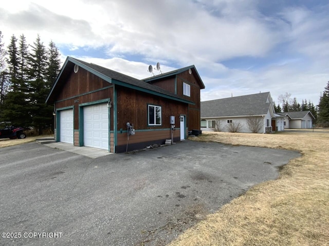 view of home's exterior with a garage