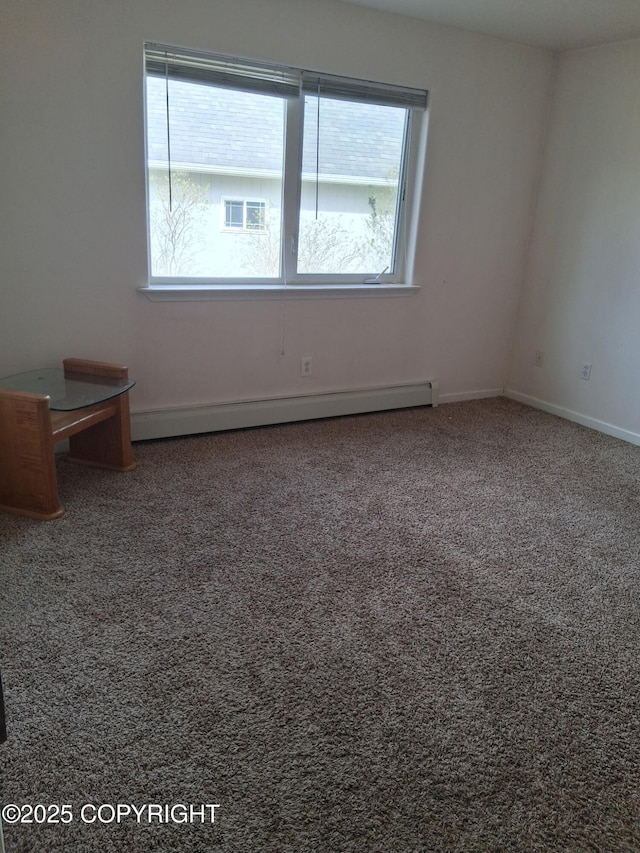 1012 Channel Way, Kenai, AK 99611 - carpeted spare room featuring baseboard heating and baseboards
