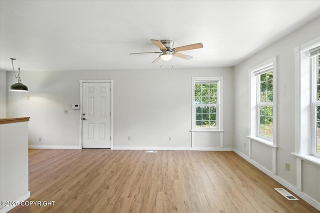 6132 S Northern Lights St, Wasilla, AK 99623 - spare room with light wood-style flooring and a ceiling fan