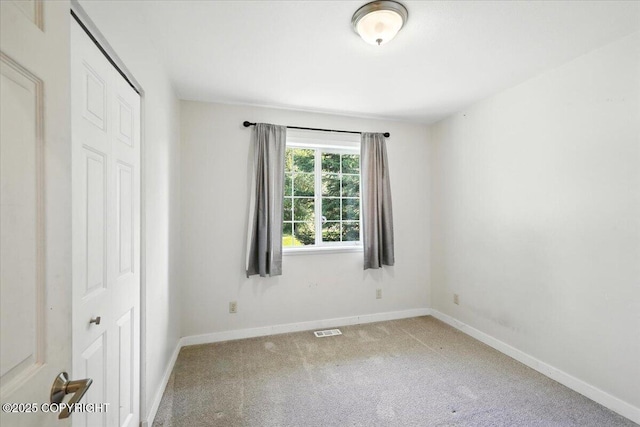 6132 S Northern Lights St, Wasilla, AK 99623 - unfurnished bedroom featuring carpet and a closet